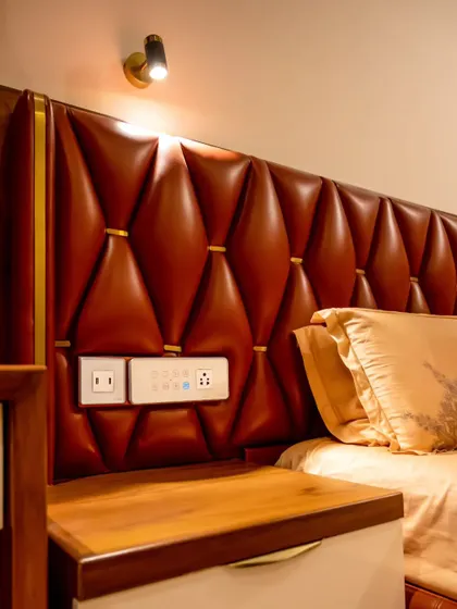 A luxurious, tufted leather headboard with our smart panel and sockets built right in, combining classic comfort with modern tech.