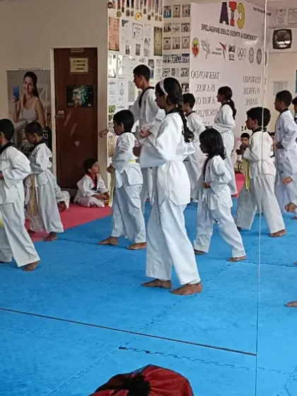 A class of white belts learning the basics under my supervision.