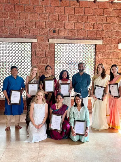 Our graduates, holding their well-earned certificates. Each frame represents a story of personal transformation and the beginning of a new path as a confident yoga teacher.