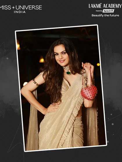 A contestant in a shimmering gold saree, with hair and makeup done by our students for the Sufi Night at Miss Universe India 2025.