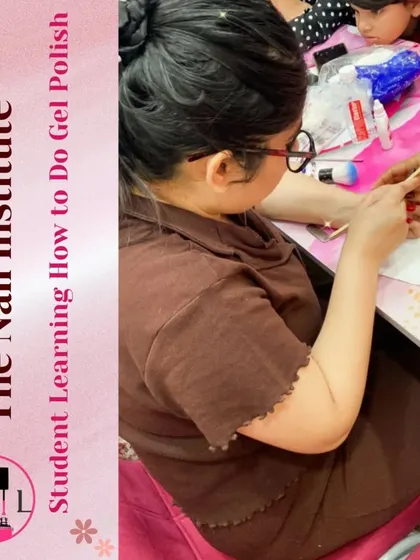 A student learns how to apply gel polish, a core skill taught in our comprehensive nail technician courses.