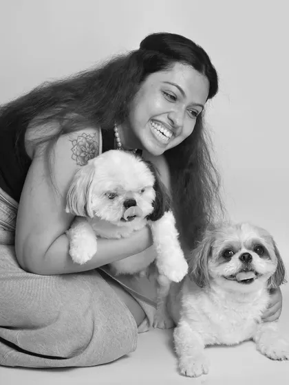 A moment of pure, candid laughter. The joy in this photo is palpable, and the black and white format makes it feel classic and everlasting.