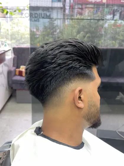 Another angle of the textured fade, showing the volume and movement in the hair.