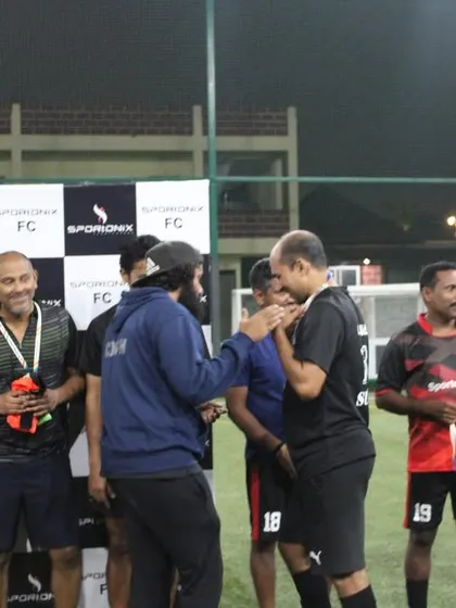 A close-up of the medal ceremony, where players are honored in front of their teammates and colleagues.