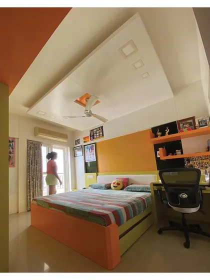This angle highlights the practical layout, providing ample space for both rest and play, with easy access to the balcony.