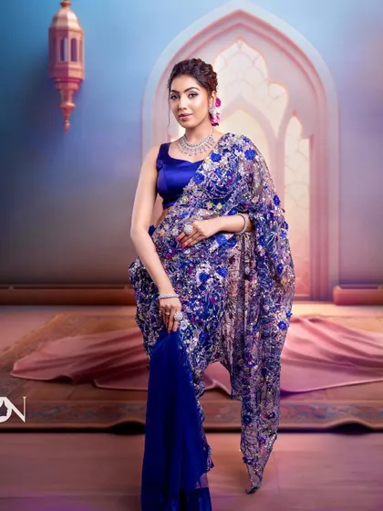 A full-length view of the subtle glam look. The CZ jewellery adds a touch of sophistication and completes this modern and elegant ensemble.