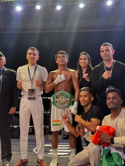 Another team photo celebrating a world youth title victory.