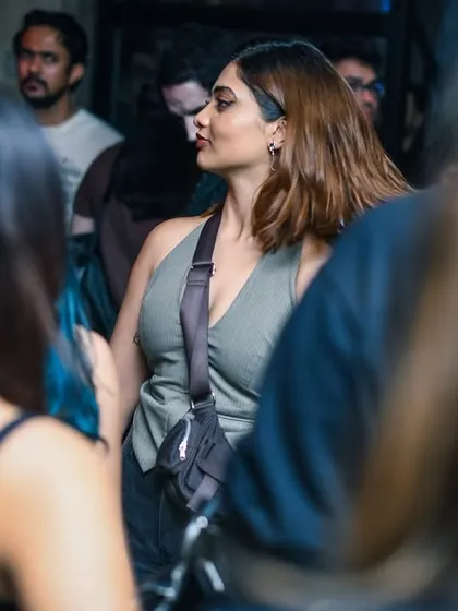 A candid moment of connection in the crowd.
