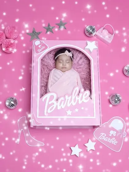 The complete Barbie setup, featuring disco balls, stars, and accessories. We design our themed shoots to be visually rich and full of fun details.