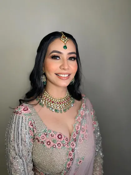 Amanpreet's happy smile is the best accessory. Her makeup was designed to make her feel confident and beautiful.