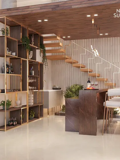We integrated a sophisticated home bar beneath the mezzanine, complete with a marble-clad counter and custom shelving. This feature adds a layer of luxury and entertainment, making efficient use of the available space.