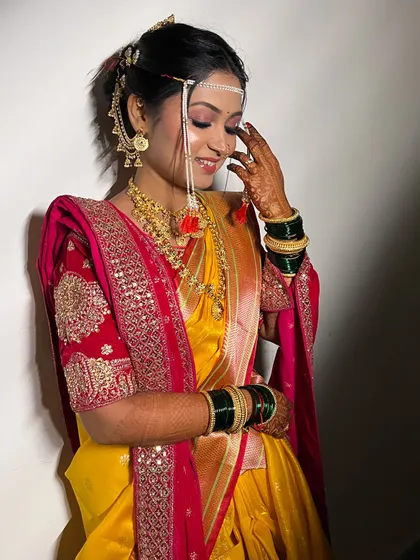 A happy, candid moment with my bride Sayali. Her natural glow is enhanced with a minimalist makeup approach, perfect for a traditional wedding.