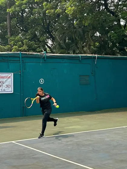 A player on the run, hitting a forehand during an intense rally in the MSSA finals.