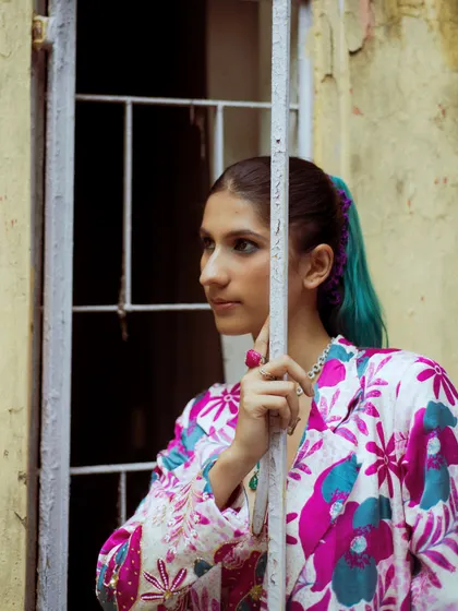 A close-up portrait from the print-on-print look. My styling is about creating a complete character, from the outfit and accessories right down to the hair and makeup.
