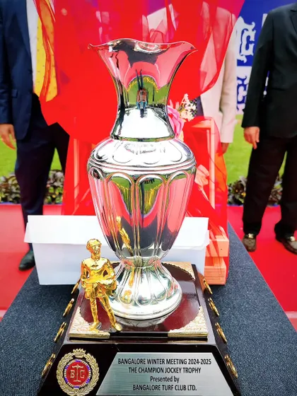 The Champion Jockey Trophy, featuring a golden jockey figurine, celebrating the skill and dedication of the season's best rider.