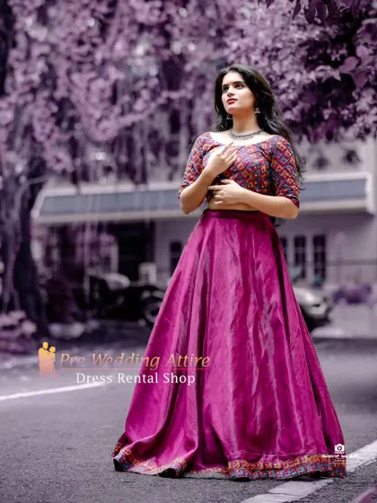 A standing pose in the magenta skirt and printed top, highlighting the flattering A-line silhouette.