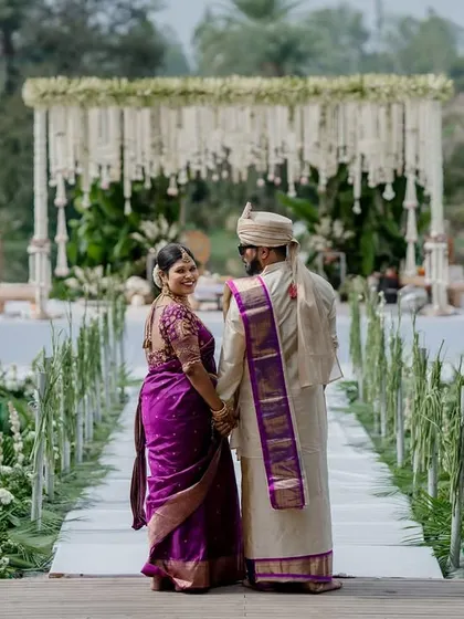 A beautiful moment on a floating mandap. The unique venue and the couple's connection create a truly magical and unforgettable wedding portrait.