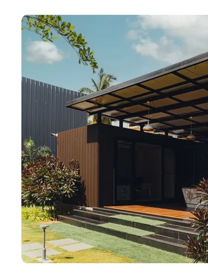 This view of the twin container office highlights the covered outdoor deck that connects the two modules. This space serves as a semi-outdoor breakout area, enhancing the functionality of the office.