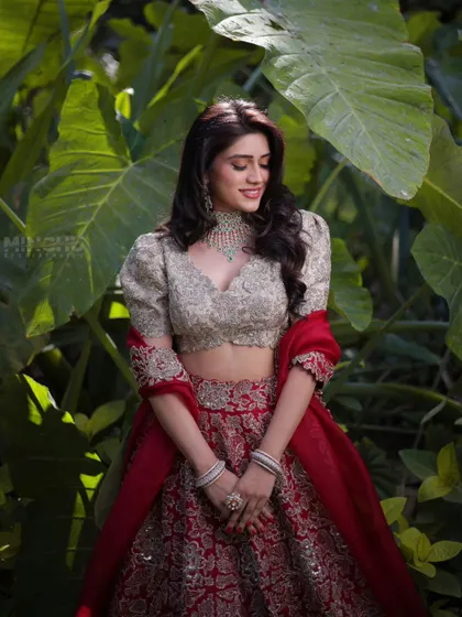 A beautiful, happy portrait of Mahima. Her makeup is fresh and glowing, capturing the joy of her engagement day.