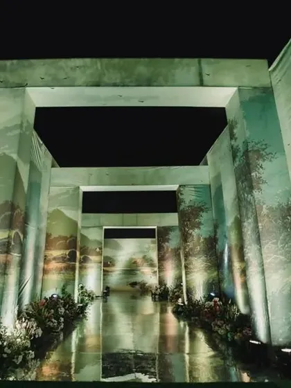 A closer look at the hand-painted landscape walls of the entryway. This immersive design element transforms a simple walkway into an artistic journey.
