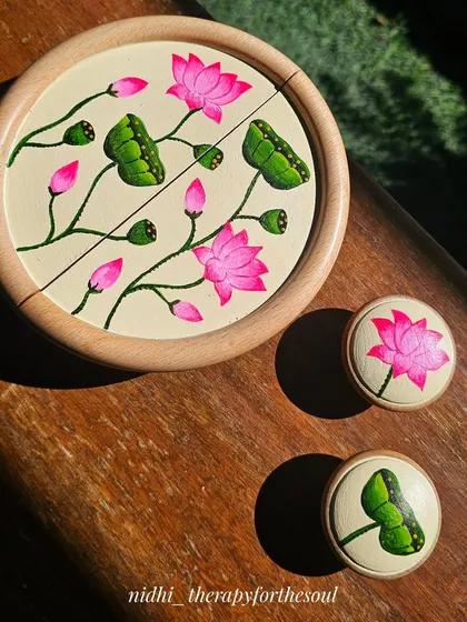 I love how these hand-painted furniture handles turned out. The Pichwai-inspired lotus design adds a pop of bright pink and green, completely transforming a simple TV unit with a touch of traditional Indian art.