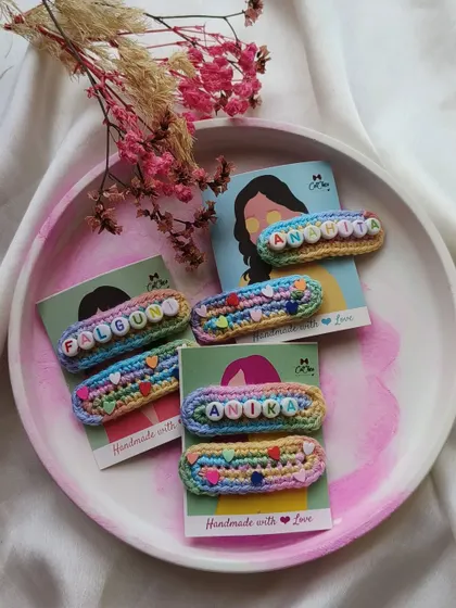 A lovely collection of custom name clips for Anika, Falguni, and Anahita. The pastel rainbow crochet design is a favorite for party favors and gifts.