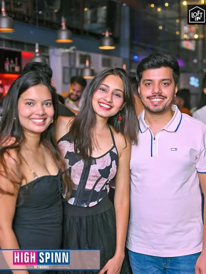 A happy trio of friends posing for the camera at Loft38.