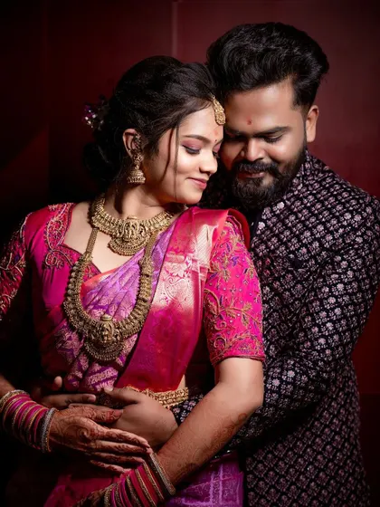 An intimate couple's portrait from Teju's engagement. Her makeup is soft and glowing, creating a romantic and timeless feel.