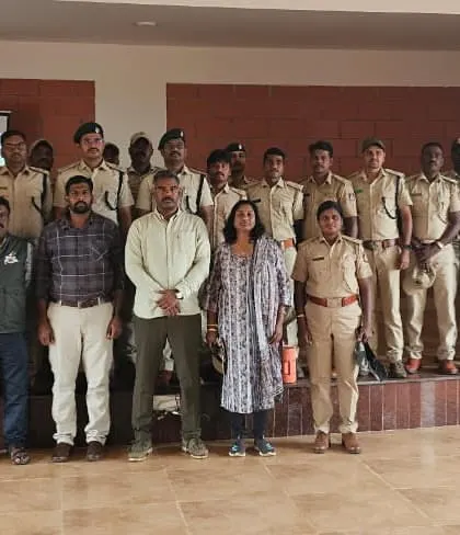 A group photo with CCF Dr. Ramesh, Chief Conservator Smt. Malathi, and other forest department officials at the Bandipur training center.