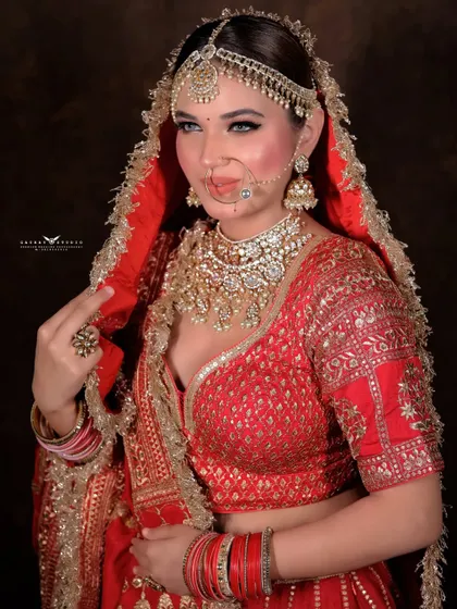 A confident portrait with a playful gesture. This shot captures the bride's personality while still maintaining a regal and elegant feel.