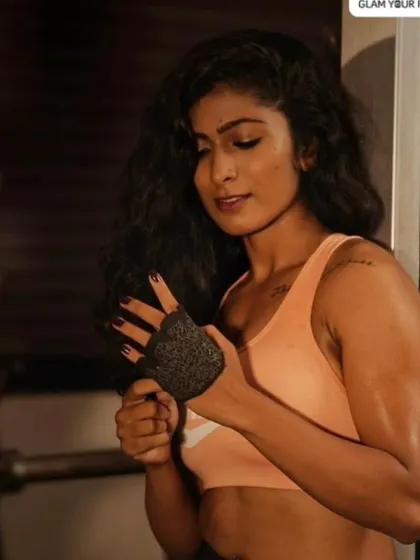 Another shot from the gym shoot with Archana Appaiah, showing how the dewy, skin-like makeup holds up and looks natural even while working out.