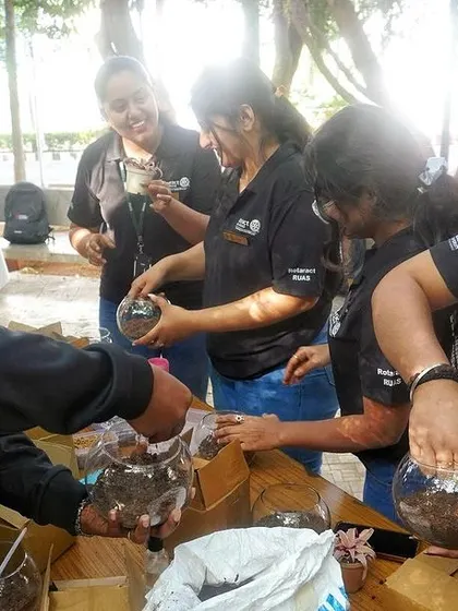 Students at Ramaiah University learning to build their own terrariums. This hands-on activity is a great way to teach biology and ecology in a fun, practical way.