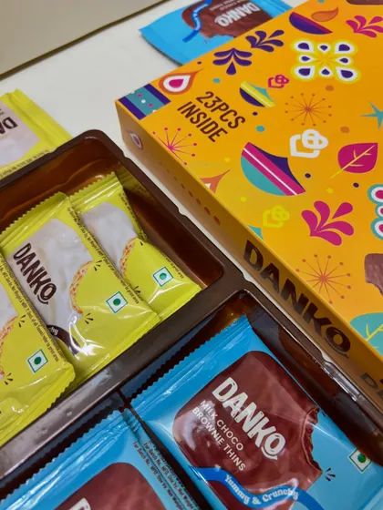 A close-up of the Danko Festive Delights box, which contains 23 pieces of their popular milk choco brownie thins and other assorted chocolates.