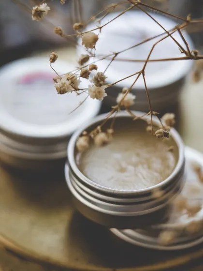 A beautifully styled shot of my natural deodorant. The metal tin is not only eco-friendly but also protects the product inside.