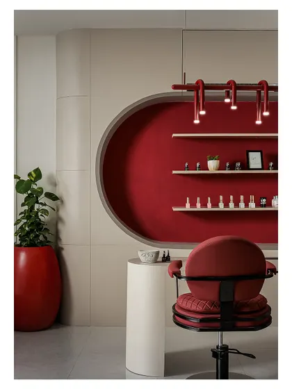 For the Snob Salon, I blended Art Deco flair with modern minimalism. This nail station nook shows my love for bold color and form, using a rich crimson backdrop and custom lighting to create an intimate, luxurious corner within a larger commercial space.