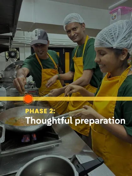 Phase 2: Thoughtful preparation. My team of chefs carefully cooking a curry, ensuring every dish is made with attention and care.