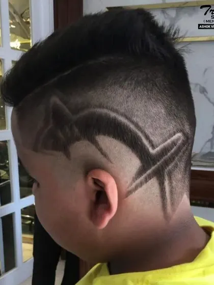 A bold and creative design for a young client. This haircut is all about standing out and having fun with style.