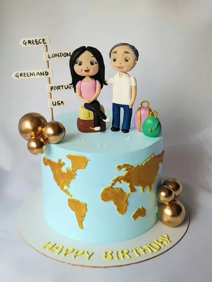 A travel-themed cake for a joint birthday celebration. The design features a world map, luggage, and custom figurines of the father-in-law and daughter-in-law.