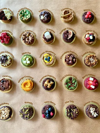 Who says you can't have cookies? I've created over 25 flavors of delicious millet flour cookies, from Classic Choco-chip to unique options like Kunafa and Matcha, with some starting at just 55 calories each.