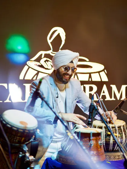A stylish shot of me playing, with my logo in the background. I bring a professional look and feel to every performance.