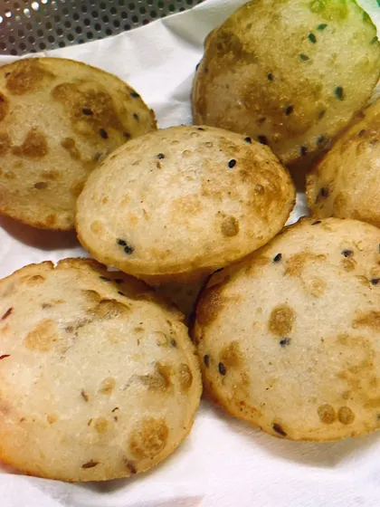 Nei Pathiri, a soft, delicate rice puri, is a Ramadan specialty. It pairs beautifully with our Nadan curries and Suriani stews, a testament to the culinary adaptations of the Malabar coast.