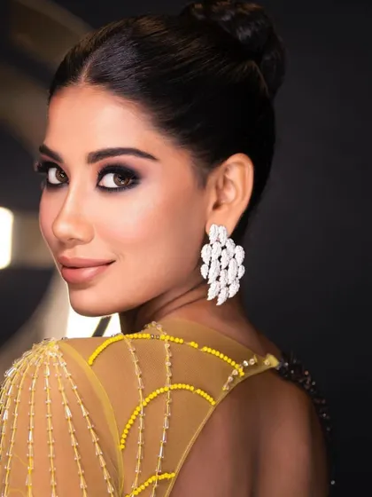 A close-up of the glam cocktail look. Learn how to create a sharp, intense smokey eye that commands attention.