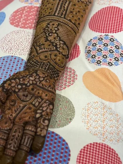 This is a detailed view of my intricate bridal henna work. Each design is unique, combining traditional patterns like paisleys and mandalas with fine-line fillers to create a stunning, full-coverage look for your special day.