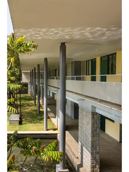 A view from the upper-level veranda, showing the play of light on the ceiling from the water below.