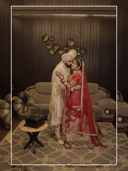 A romantic, posed portrait of the couple in an elegant room. The composition and their embrace create a feeling of timeless love, perfect for a wedding album.