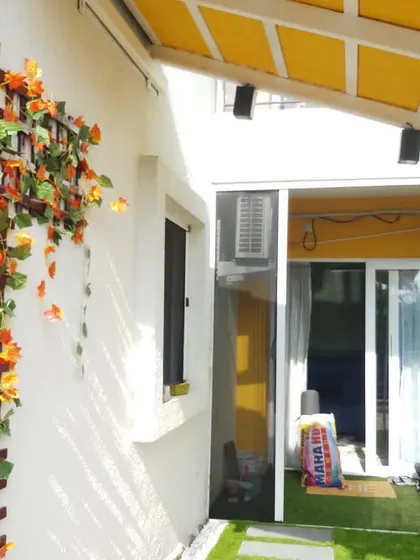 Many people buy a house for its large balcony but are not sure what to do with it. For this home, I created a simple garden space for a mother and her young child to enjoy outdoor activities together.