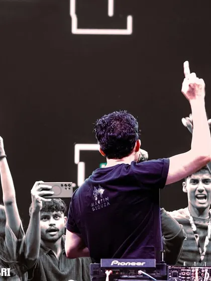 The view from behind, with students reaching out from the front row. This connection with the audience is everything.