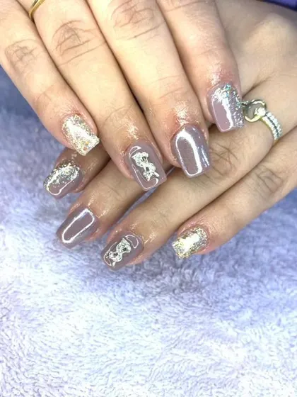 A sophisticated set in a neutral taupe color, with gold glitter and white 3D dragon accents.
