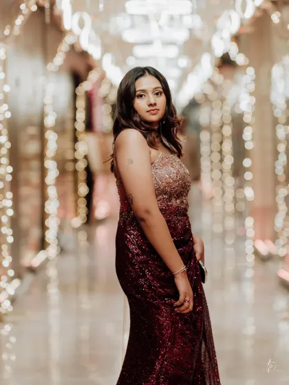 The look captures the essence of a starry reception, with twinkling details and a cosmic vibe.