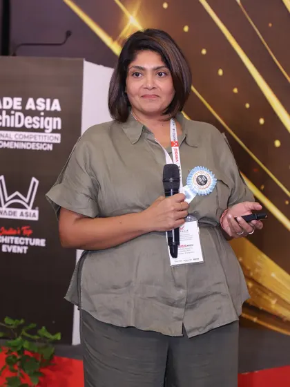 A photo of me presenting at the WADE ASIA awards. It was an honor to share our work and be recognized for our first hospitality project.